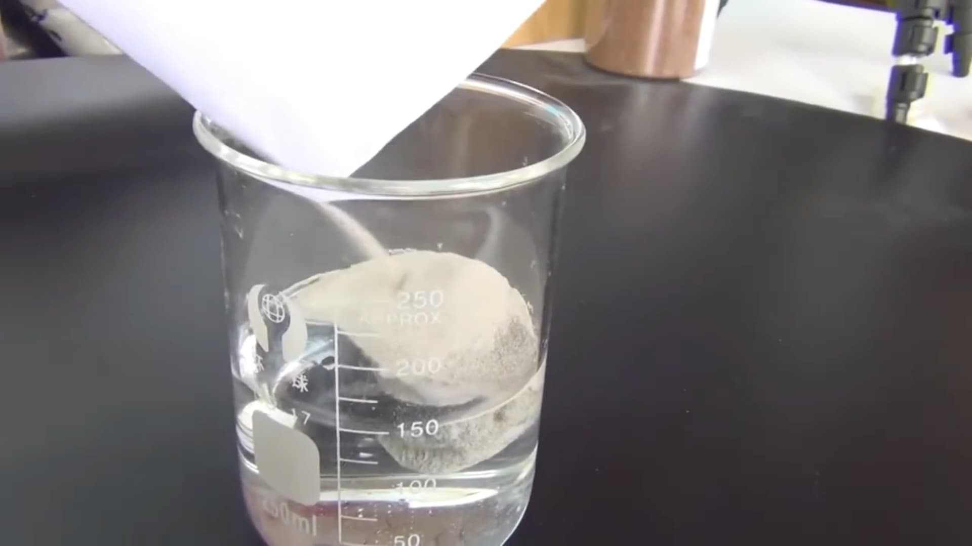 Cenospheres floating after a sample is poured into water