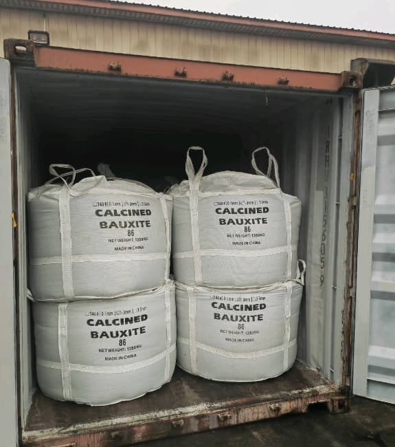 Calcined bauxite jumbo bags loaded inside a shipping container