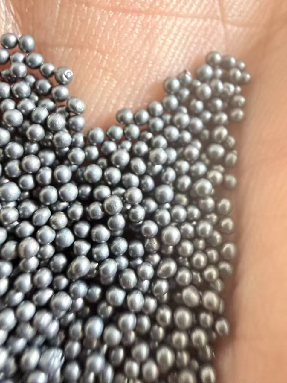 S330 steel shot sample showing rounded particles