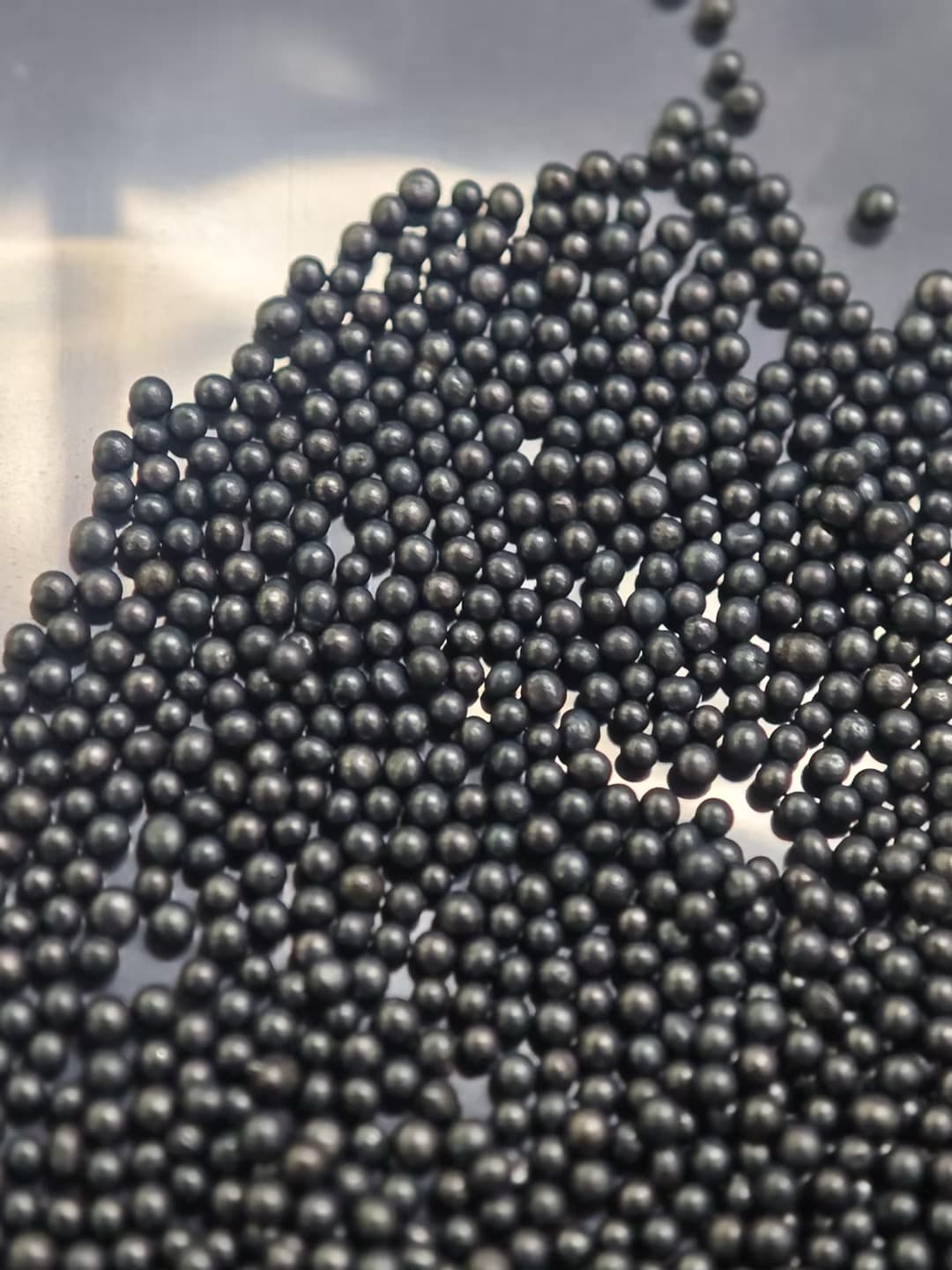 Close-up detail of cast steel shot particles