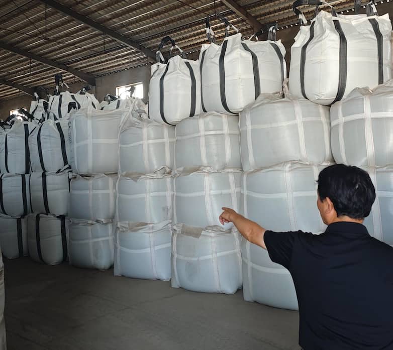 Ceramic proppant bulk bags arranged in the finished-goods warehouse
